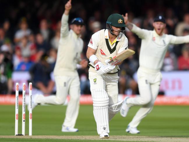 LONDON, ENGLAND - AUGUST 15: David Warner of Australia is bowled by Stuart Broad of England during day two of the 2nd Specsavers Ashes Test match at Lord's Cricket Ground on August 15, 2019 in London, England. (Photo by Gareth Copley/Getty Images)