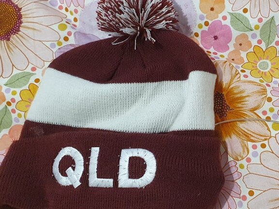 The free beanie handed out at the Townsville State of Origin on Wednesday that contained a button battery.