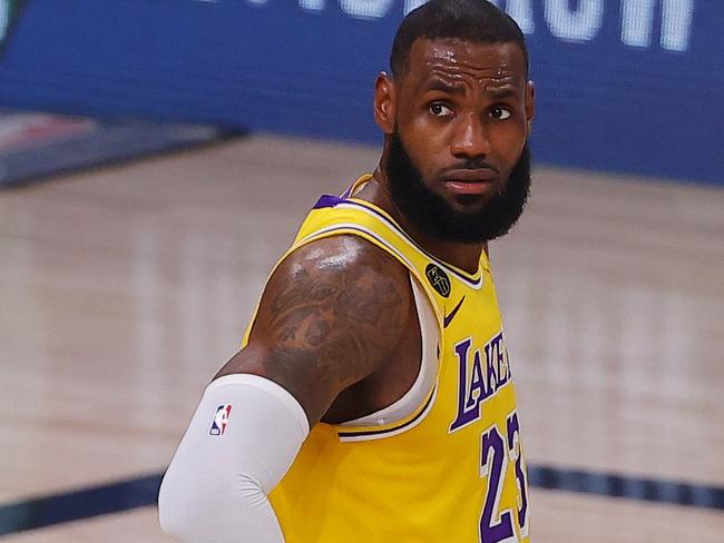 LAKE BUENA VISTA, FLORIDA - SEPTEMBER 18: LeBron James #23 of the Los Angeles Lakers looks on against the Denver Nuggets during the third quarter in Game One of the Western Conference Finals during the 2020 NBA Playoffs at AdventHealth Arena at the ESPN Wide World Of Sports Complex on September 18, 2020 in Lake Buena Vista, Florida. NOTE TO USER: User expressly acknowledges and agrees that, by downloading and or using this photograph, User is consenting to the terms and conditions of the Getty Images License Agreement.   Mike Ehrmann/Getty Images/AFP == FOR NEWSPAPERS, INTERNET, TELCOS & TELEVISION USE ONLY ==