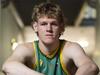 Inside the life of Qld’s towering 219cm teen NBA prospect