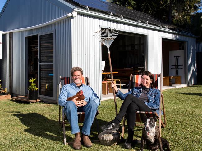 Adam Russell and Suzy Pickles with Chook Norris and Lily the staffy - Bulli NSW - sustainable living - Picture by Anna Warr