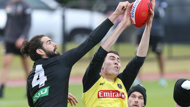 Brodie Grundy competes with Mason Cox at Collingwood training.