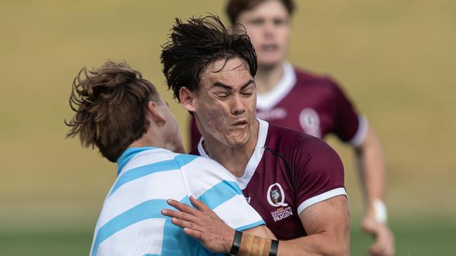 Sean Weir takes a big hit. Picture: Julian Andrews