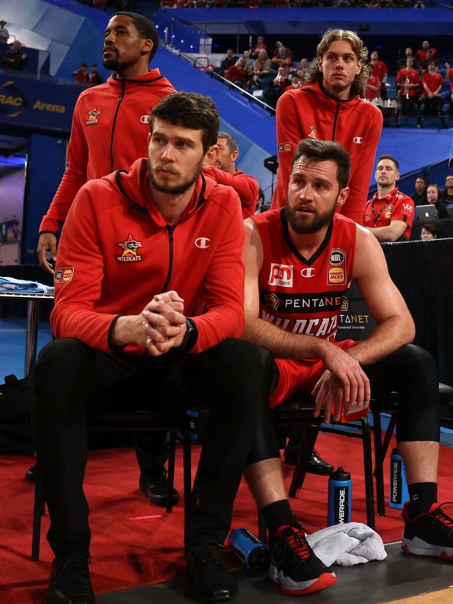 Mitchell Norton (front right) of the Wildcats looks on from the bench with Clint Steindl, Bryce Cotton and Luke Travers during game two of the NBL Grand Final Series between the Perth Wildcats and Melbourne United at RAC Arena, on June 20, 2021, in Perth, Australia. (Photo by Paul Kane/Getty Images)