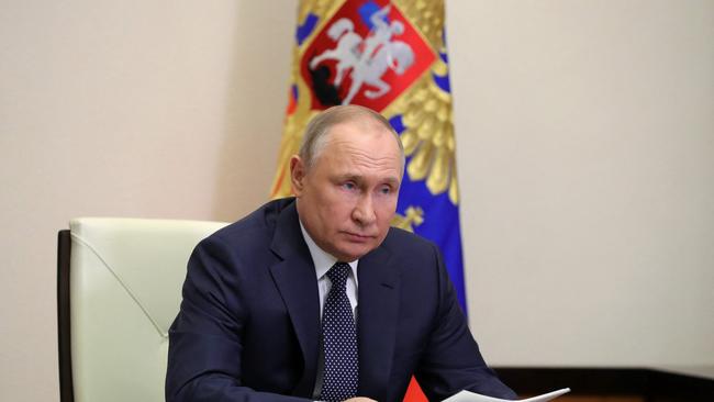 Russian President Vladimir Putin should face a war crimes trial, according to his US counterpart Joe Biden. Picture: Mikhail KLIMENTYEV / SPUTNIK / AFP