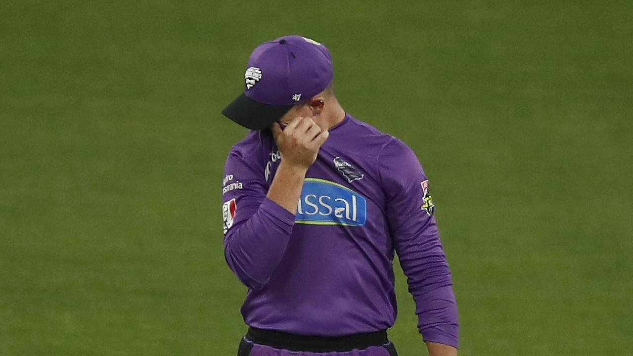 D'Arcy Short of the Hurricanes reacts after dropping a simple catch against the Sydney Sixers.