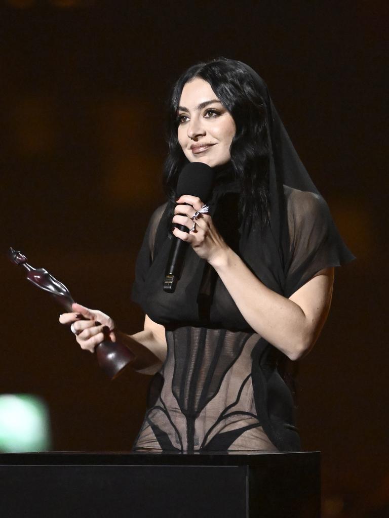 … and accepting her award. Picture: Gareth Cattermole/Getty