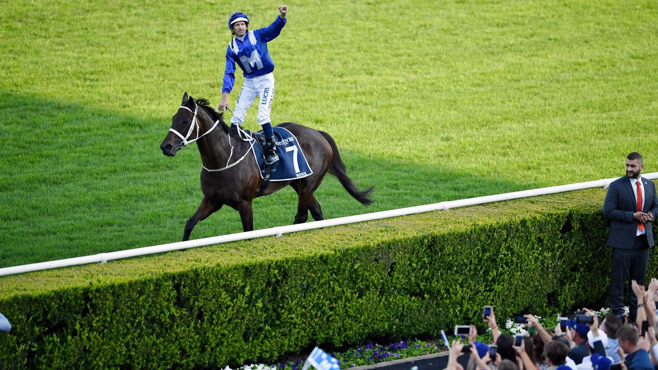 Bowman celebrates Winx’s 33rd win in succession after the Queen Elizabeth Stakes in 2019. Picture: AFP