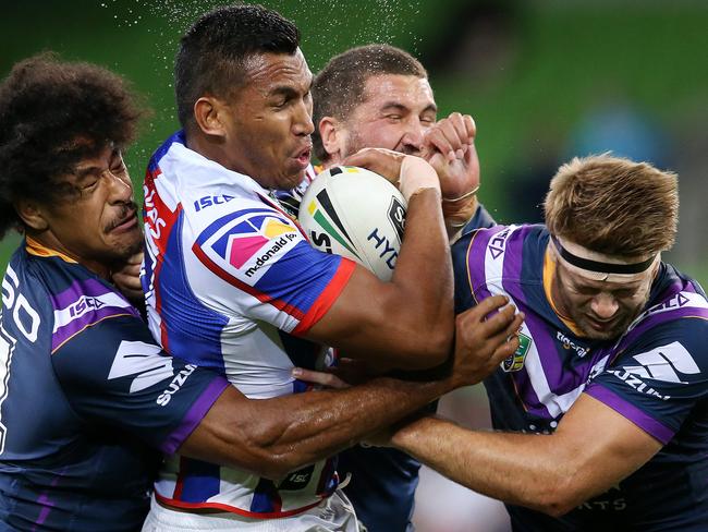 Jacob Saifiti gets smashed in a Storm tackle. Pic: Michael Klein