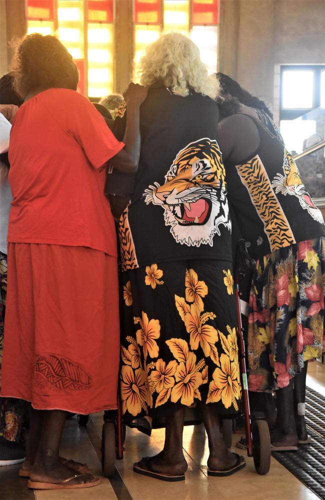 Many at the funeral wore yellow and black or Tigers merchandise to acknowledge the former MLA's love of the Richmond Tigers and Imalu Tigers. Picture: Sierra Haigh