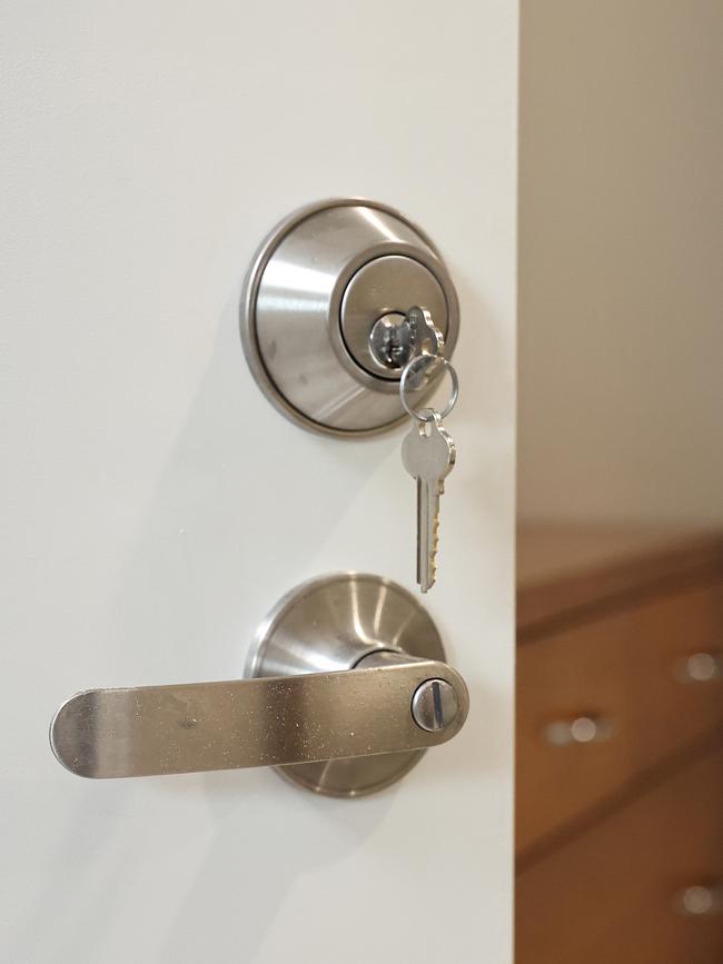 A deadlock, or deadbolt, installed onto a bedroom door inside a Cairns home. Picture: Brendan Radke