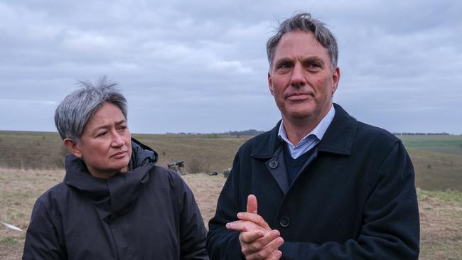 Richard Marles and Penny Wong watch Australian troops train Ukrainian civilians in the UK. Picture: Jacquelin Magnay.