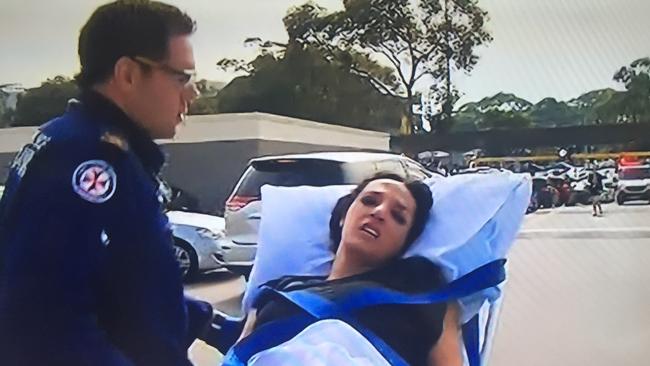 A woman was taken to hospital after a shooting at a Bankstown shopping centre. Picture: Channel 9