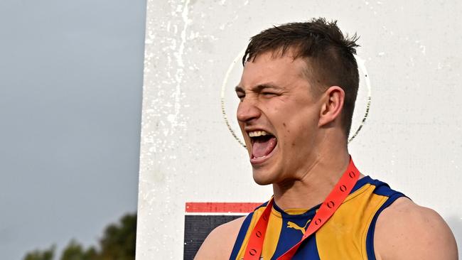 Noble Park captain Kyle Martin celebrates the EFL Premier Division premiership. Picture: Andy Brownbill