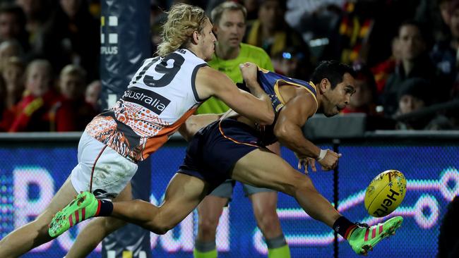 Eddie Betts kicks his 2016 Goal of the Year in front of Giant Nick Haynes. Picture Simon Cross