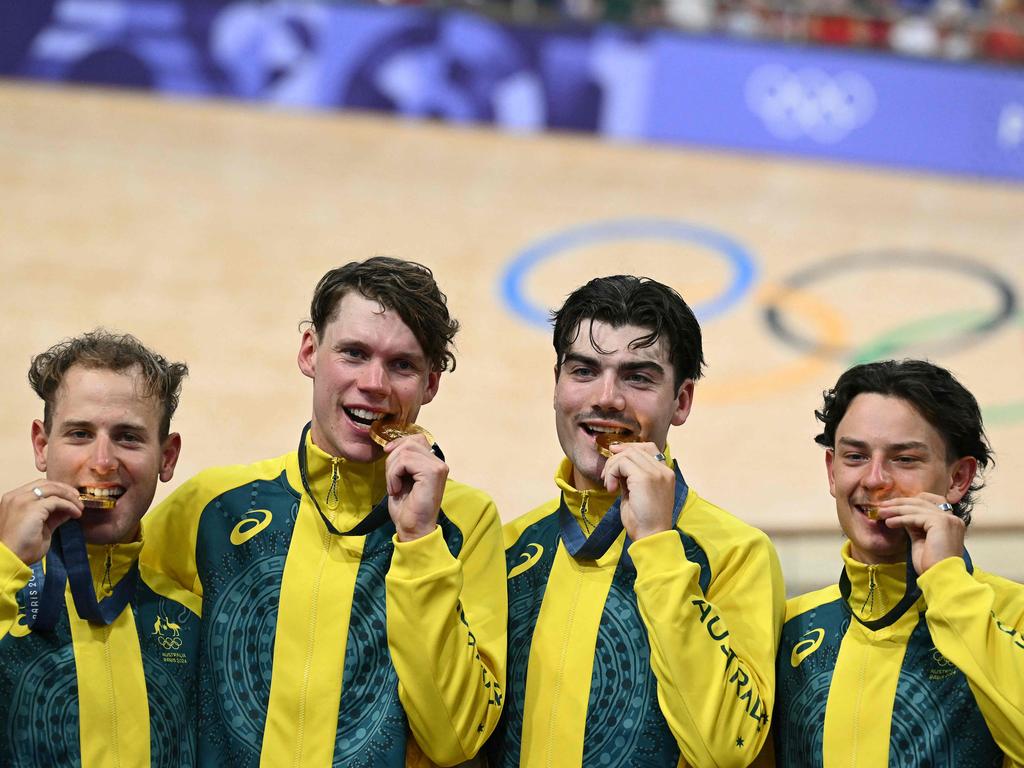 Sam Welsford, Kelland O'brien, Conor Leahy and Oliver Bleddyn show off their gold medals. Picture: AFP