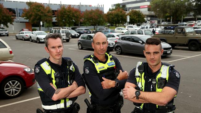 Constables Troy Keith, David Moloney and First Constable Sam Barty patrol a Broadmeadows carpark in February. Picture: Hamish Blair