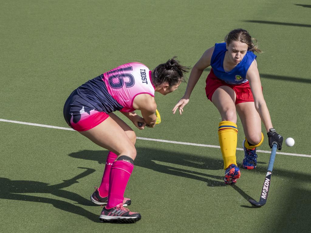 Kacie Trost, Toowoomba and Madeline Denny, Brisbane. Toowoomba 1 vs Brisbane. Hockey Queensland Championship at Clyde Park, Toowoomba. Saturday, May 1, 2021. Picture: Nev Madsen.