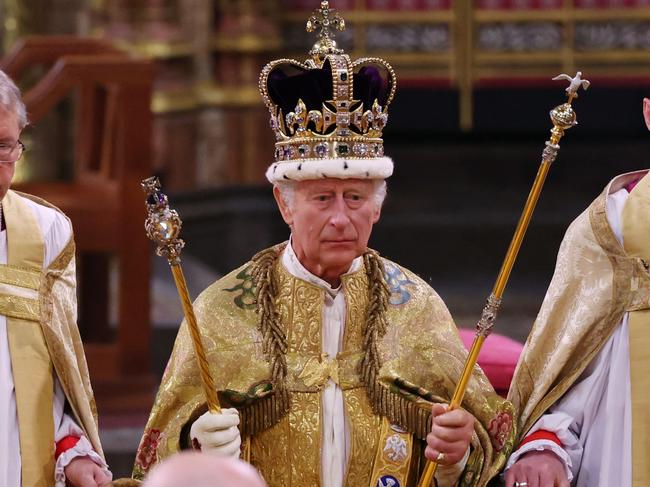 LONDON, ENGLAND - MAY 06:  King Charles III stands after being crowned during his coronation ceremony in Westminster Abbey, on May 6, 2023 in London, England. The Coronation of Charles III and his wife, Camilla, as King and Queen of the United Kingdom of Great Britain and Northern Ireland, and the other Commonwealth realms takes place at Westminster Abbey today. Charles acceded to the throne on 8 September 2022, upon the death of his mother, Elizabeth II. (Photo by Richard Pohle - WPA Pool/Getty Images) *** BESTPIX ***