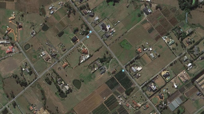 This rural land could become the bustling town centre of Cecil Park, according to the current proposals.