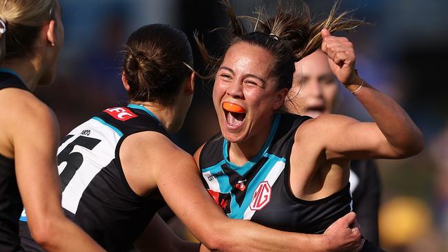 PERTH, AUSTRALIA - OCTOBER 05: Justine Mules-Robinson of the Power celebrates a goal during the round six AFLW match between West Coast Eagles and Port Adelaide Power at Mineral Resources Park, on October 05, 2024, in Perth, Australia. (Photo by Paul Kane/Getty Images)