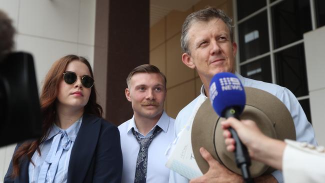 American Marine Anthony Long, centre, with defence team Peter Maley, right, and Brooke Houen, left, outside the Supreme Court in Darwin. Mr Long was found not guilty of raping a hungover woman on Robertson Barracks in late 2023. Picture: Zizi Averill