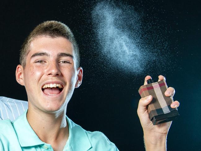 Sebastian Cox,16,and his brother Leonardo Cox ,14, spray  their aftershaves they love the most at the Cumberland Park home Friday,December,14,2024.Picture Mark  Brake