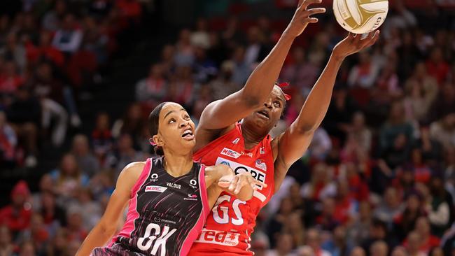 SYDNEY, AUSTRALIA - JUNE 24: Romelda Aiken-George of the Swifts reaches for the ball defended by Shamera Sterling of the Thunderbirds during the Super Netball Semi Final match between NSW Swifts and Adelaide Thunderbirds at Ken Rosewall Arena, on June 24, 2023, in Sydney, Australia. (Photo by Jenny Evans/Getty Images)