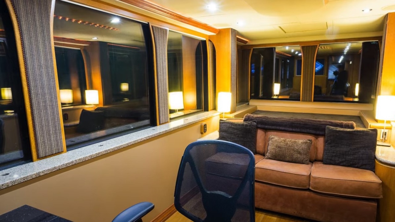 The bedroom area also turns into an office space. (Picture: YouTube/Ridiculous Rides)