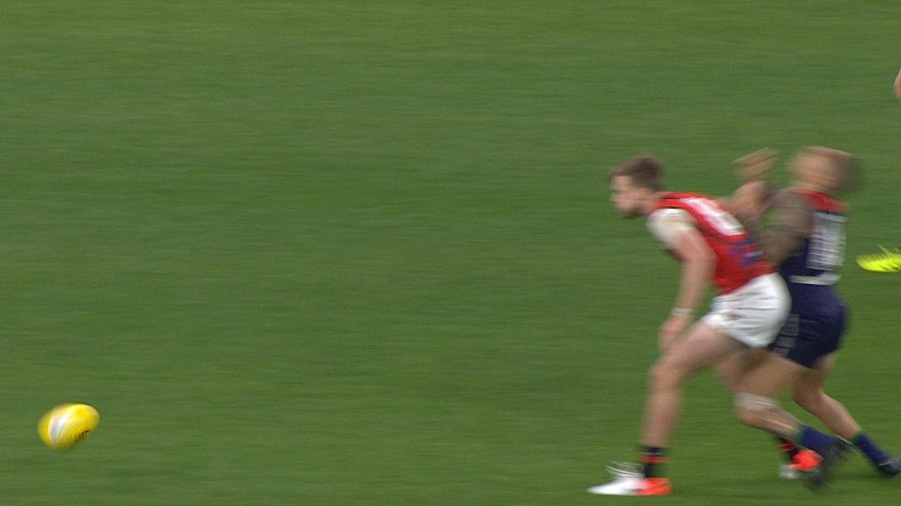 Michael Walters throws his head back after being bumped.