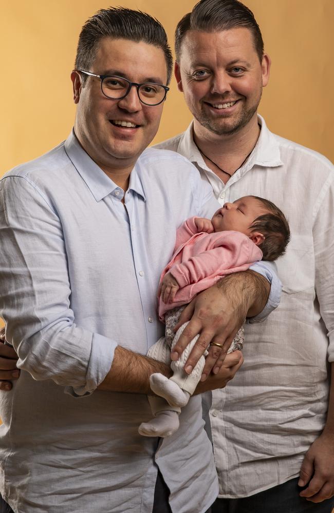 Baden and Nelson Marino-Hall with baby Amalia. Picture: Mark Cranitch