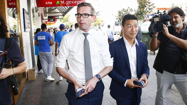 Then-NSW treasurer Dominic Perrottet, later premier, with Mr Yung during his 2019 contest. Picture: Dylan Robinson