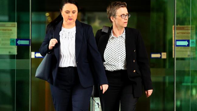 Scientists Kylie Rika and Ingrid Moeller leaving the DNA inquiry. Picture: David Clark