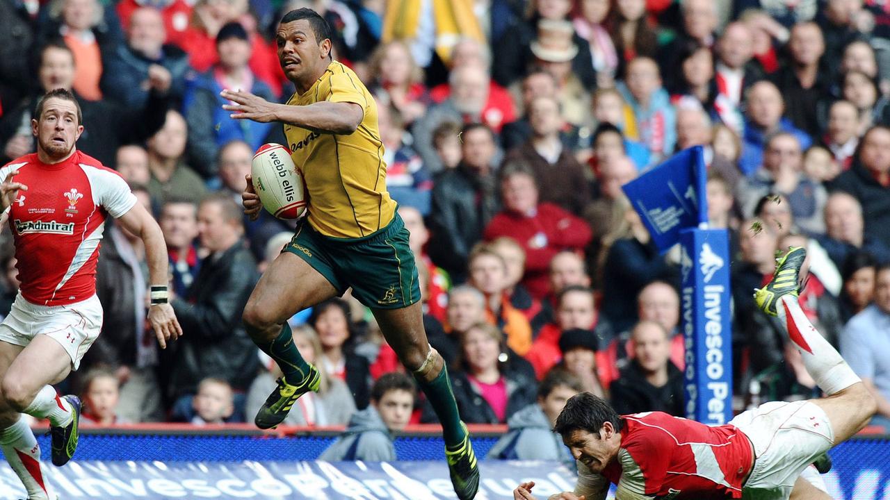 Wallabies star Kurtley Beale breaks through to score a try in Cardiff in 2010.