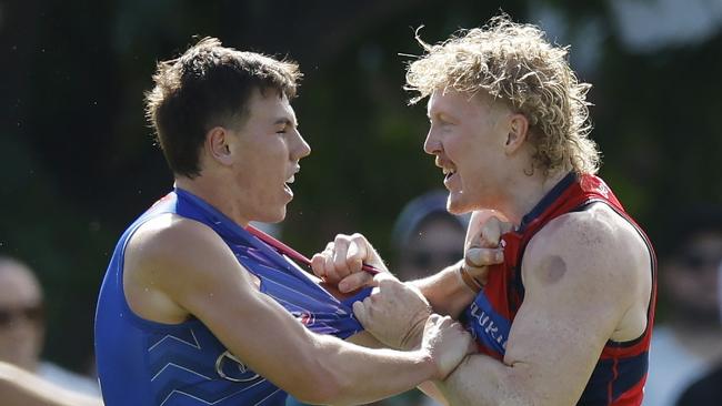 NCA. MELBOURNE, AUSTRALIA. 22nd February, 2025 . North Melbourne vs Melbourne at Arden St Oval.   Clayton Oliver of the Demons welcomes Finn OÃSullivan of the Kangaroos to the big time    .  Picture: Michael Klein