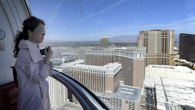 Jen Chase looks out from one of the cabins as she rides the Las Vegas High Roller. Pictur