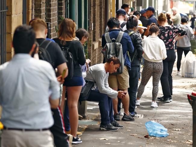 SUNDAY TELEGRAPH - 27/3/20Lines of unemployed people outside Surry Hills Centrelink today as the COVID-19 pandemic causes massive job losses. Picture: Sam Ruttyn