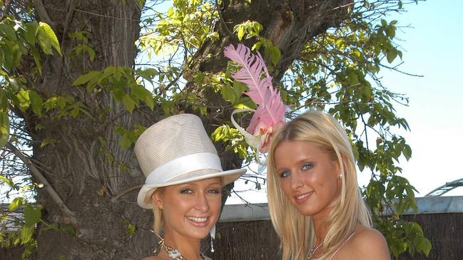 4 November 2003 - NICKY and PARIS HILTON at the Flemington Racecourse for the Melbourne Cup Day during the Melbourne Cup Carnival 2003. Melbourne, Victoria, Australia. (Photo by Regis Martin/Getty Images)