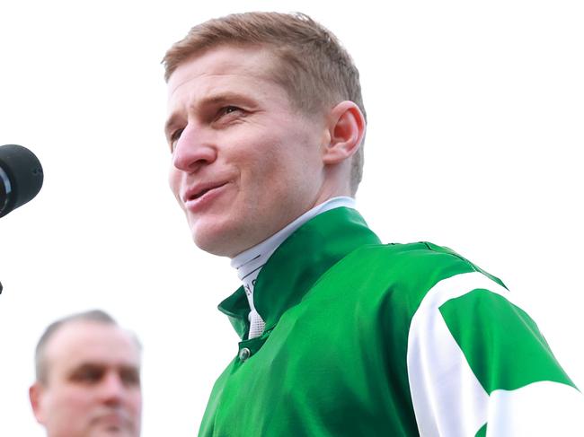 MELBOURNE, AUSTRALIA - OCTOBER 26: James McDonald speaks after riding Via Sistina (IRE) to win the Ladbrokes Cox Plate and his 100th Group 1 race during Cox Plate Day at Moonee Valley Racecourse on October 26, 2024 in Melbourne, Australia. (Photo by Kelly Defina/Getty Images)