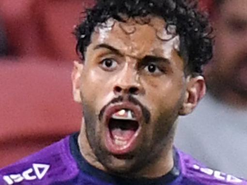 BRISBANE, AUSTRALIA - JULY 02:  Josh Addo-Carr of the Storm celebrates after scoring a try during the round eight NRL match between the Melbourne Storm and the Sydney Roosters at Suncorp Stadium on July 02, 2020 in Brisbane, Australia. (Photo by Bradley Kanaris/Getty Images)