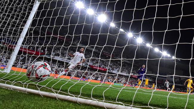United Arab Emirates forward Ali Mabkhout scores the only goal in the Asian Cup quarter-final soccer match with Australia. Picture: Giuseppe Cacace/AFP