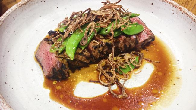 Black Angus striploin beef with confit eschalot and gremolata.