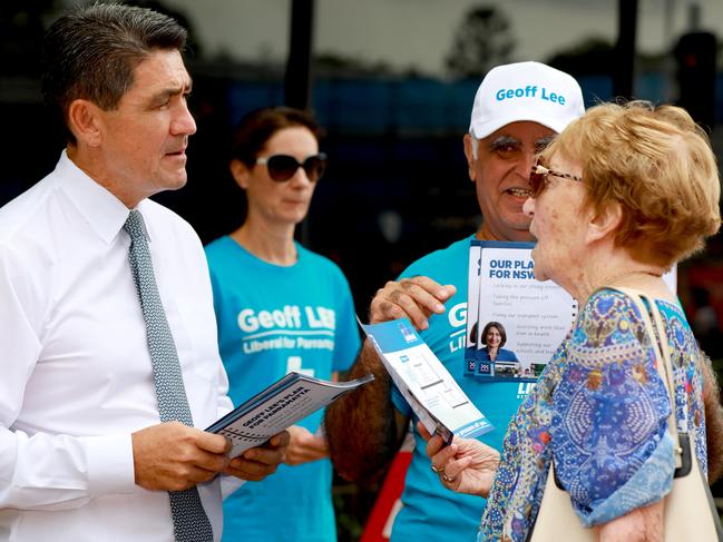 ‘Ugly side of politics’: Liberal candidate for Parramatta Geoff Lee, pictured chatting to voters at the prepoll location in Parramatta today. Picture: Angelo Velardo