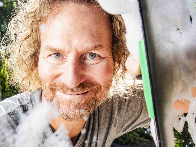Lawrence Walker, 51, owns Frankston Window and Cleaning Service and has applied to access his super early. He is withdrawing $10,000 now and another $6000 next financial year which is all of his retirement savings. He's using it to pay off a credit card debt. He said each day his super balance is dropping due to market falls and he can't get his money quick enough. Photos of him please working on the job. He is to look complacent because he can't access his money. Picture- Nicole Cleary