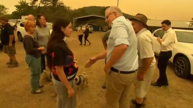 A Cobargo resident refuses to shake Scott Morrison’s hand in January. Picture: Supplied