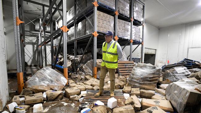 Former Prime Minister Scott Morrison inspects flood damage at Norco’s Lismore ice cream factory, which the co-operative is about to rebuild.