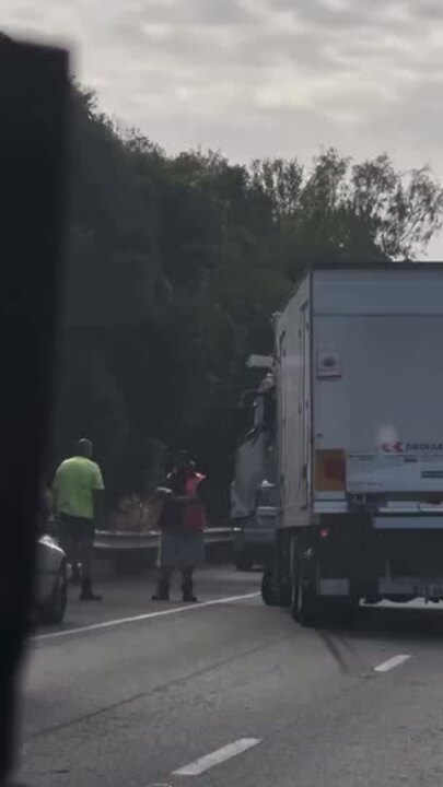 Traffic chaos unfolds as two trucks collide on M1 | NT News