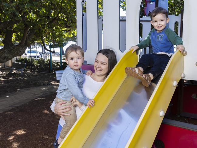 Jessy Meredith with three-year-old Oliver and two-year-old Eli at Scarborough Beach. Picture: Richard Walker