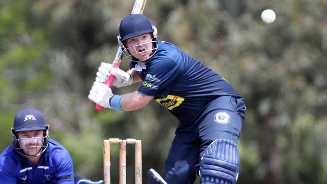 Jack Rhodes keeps an eye on the ball for Hoppers Crossing.