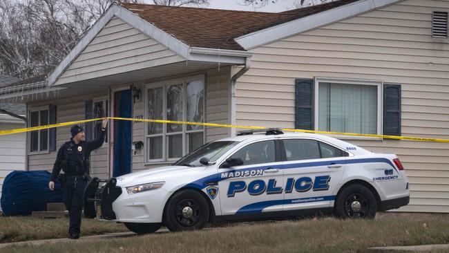 Police stand guard outside Rupnow’s family’s home. Picture: Scott Olson/Getty/AFP